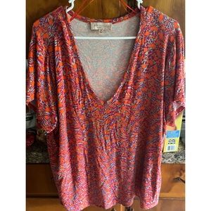 Women’s colorful top.
